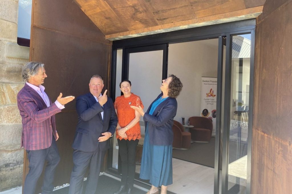 Adam Crouch (second from left) with (l-r) Central Coast Conservatorium of Music Artistic Director Patrick Brennan, CEO Lisa Barnes and President Claire Braund admire the Con's new entrance.